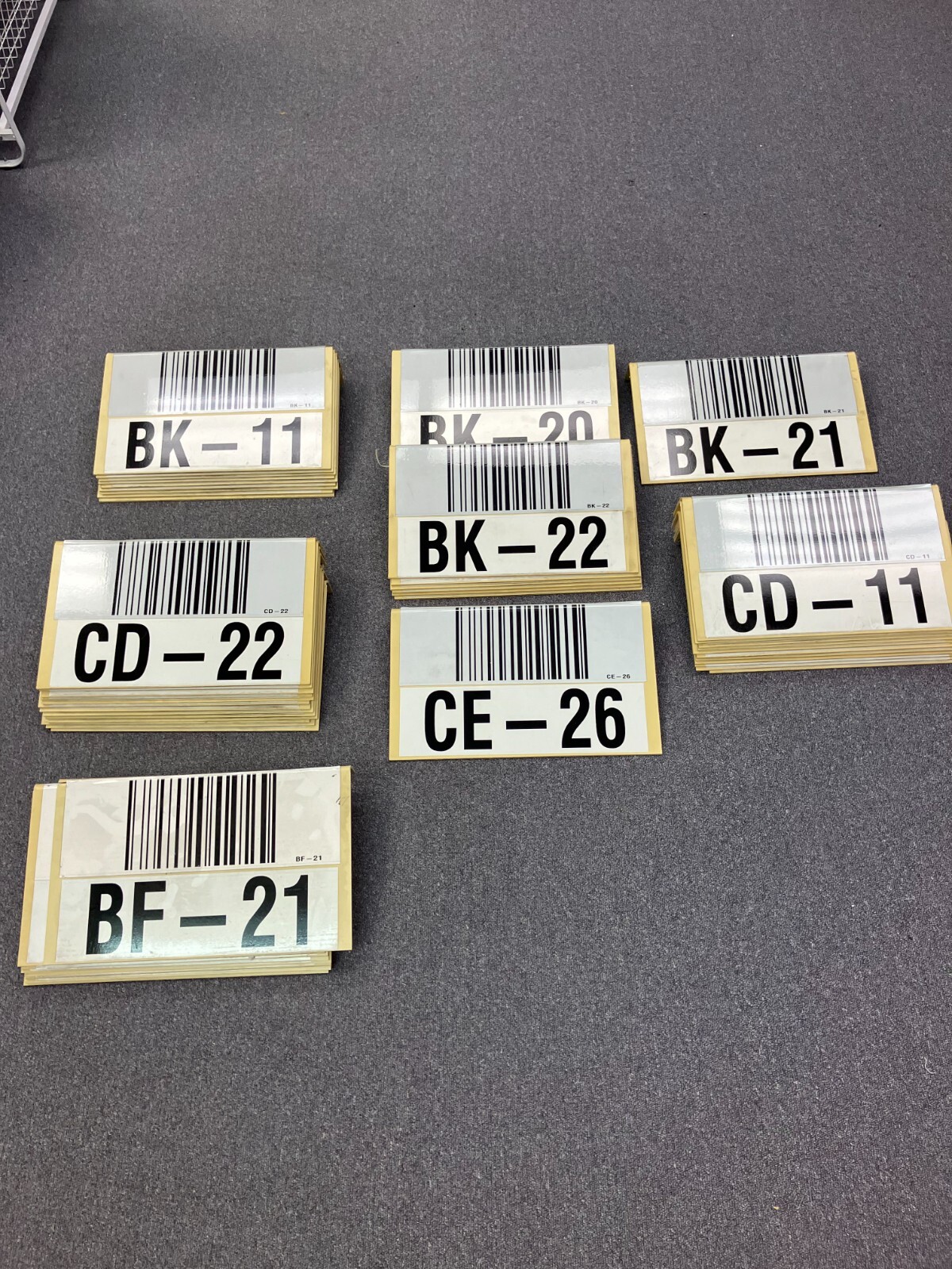 Set of 50 WAREHOUSE HANGING SIGN ANGLED FOOT, USED